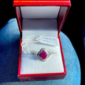 Natural ruby and diamond ring set in 14 k white gold